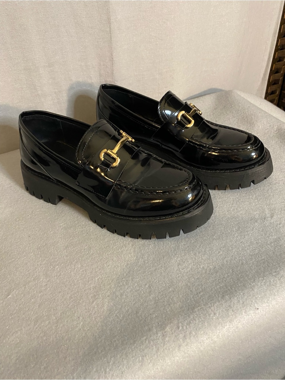 Steve Madden Black Patent Lug Sole Loafers with Gold Bit